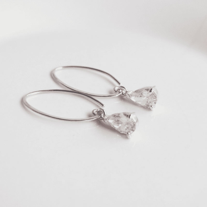 Aretes de plata 950 largos con gota de luz cristal